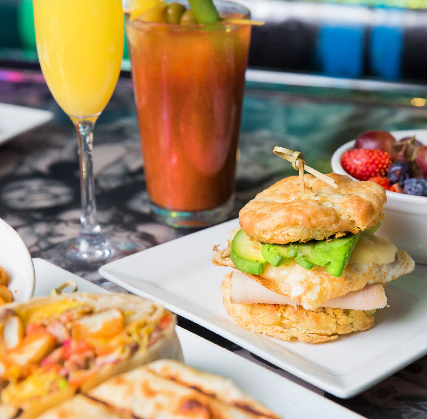 Assortment of Brunch food with Mimosa and Bloody Mary